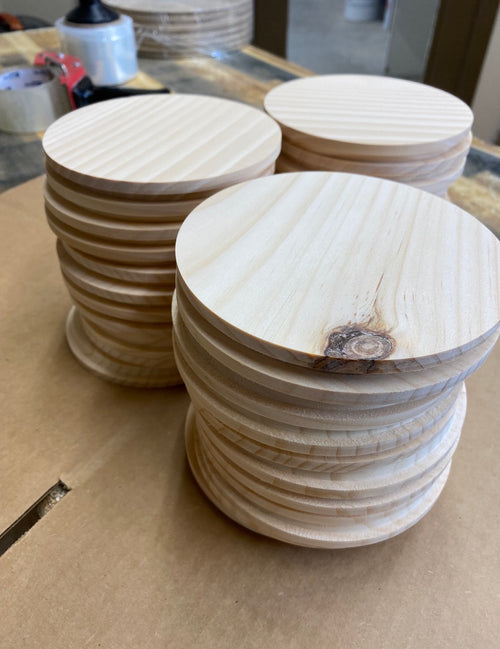 Pine candle lids for Welch Candle Company.